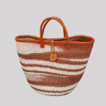 Handmade African woven basket bag with brown and white patterns and leather handles