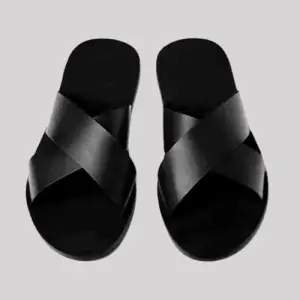 Black handcrafted leather sandals with braided strap design