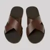 Black handcrafted leather sandals with braided strap design