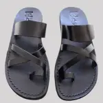 Black handcrafted leather sandals with braided strap design