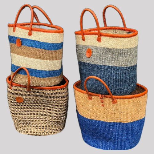 Handmade African woven basket bag with brown and white patterns and leather handles