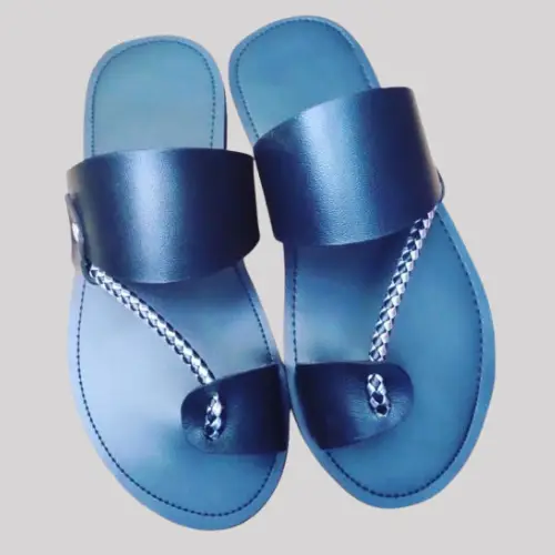 Black handcrafted leather sandals with braided strap design